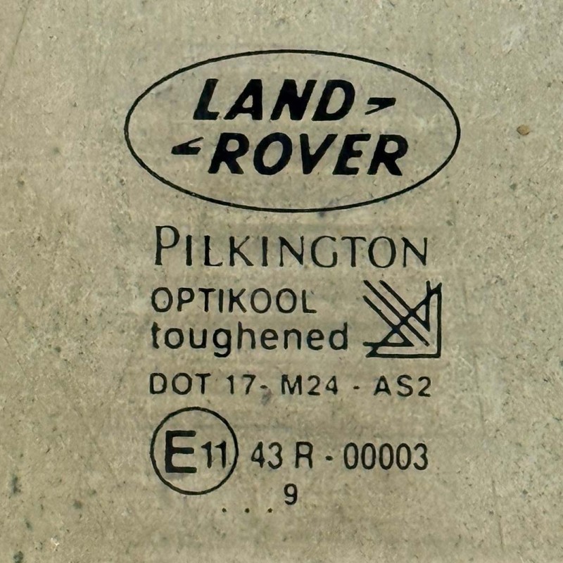 Green tinted door window - rear left Disco2 - Used